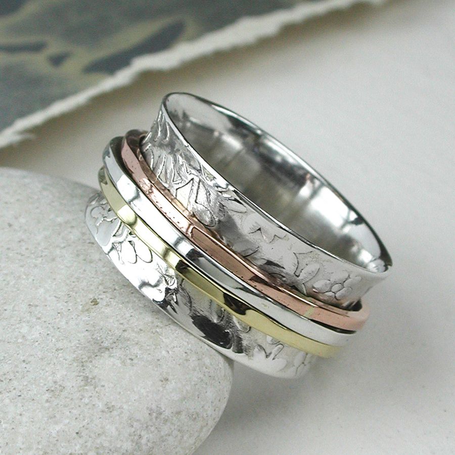 Beautiful and unusual sterling silver spinning ring with copper, brass and silver free spinning Beautiful and unusual sterling silver spinning ring with copper, brass and silver free spinning
