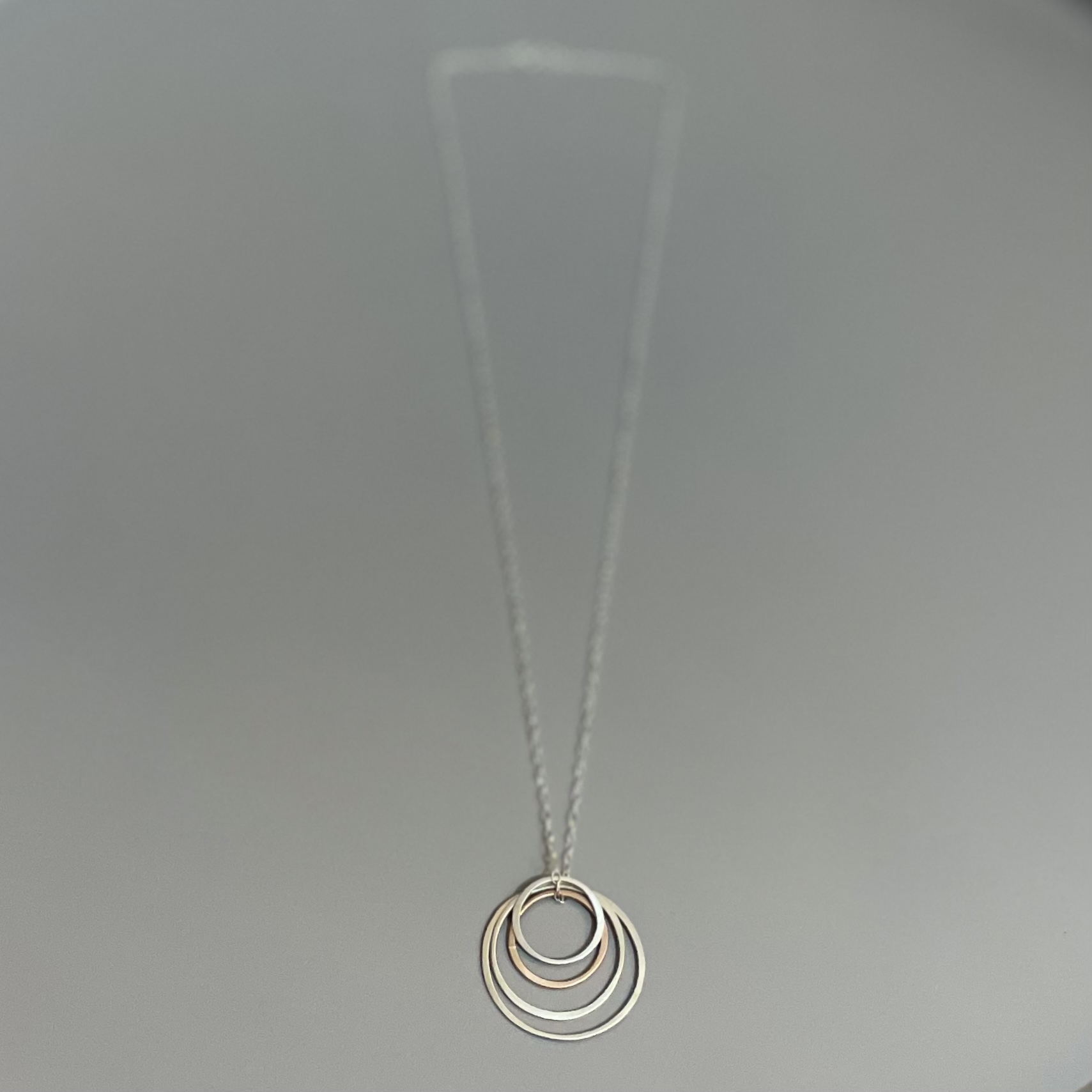Rose gold and silver circle necklace by Rose Teleri