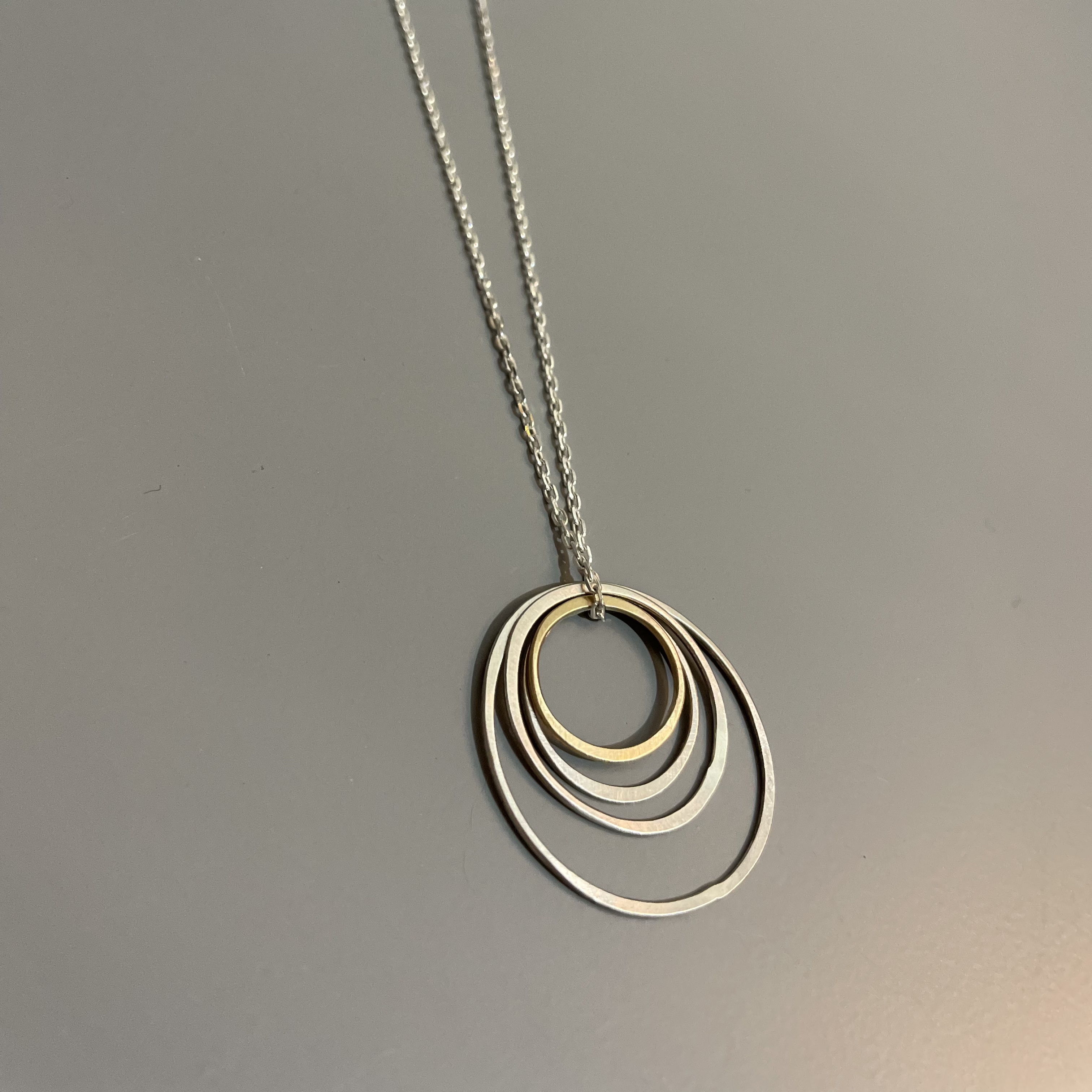 Yellow Gold and Silver Circle Necklace by Rose Teleri