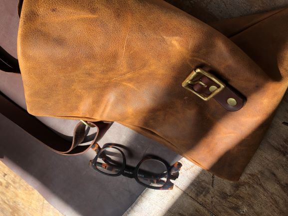 Leather roll top shoulder bag