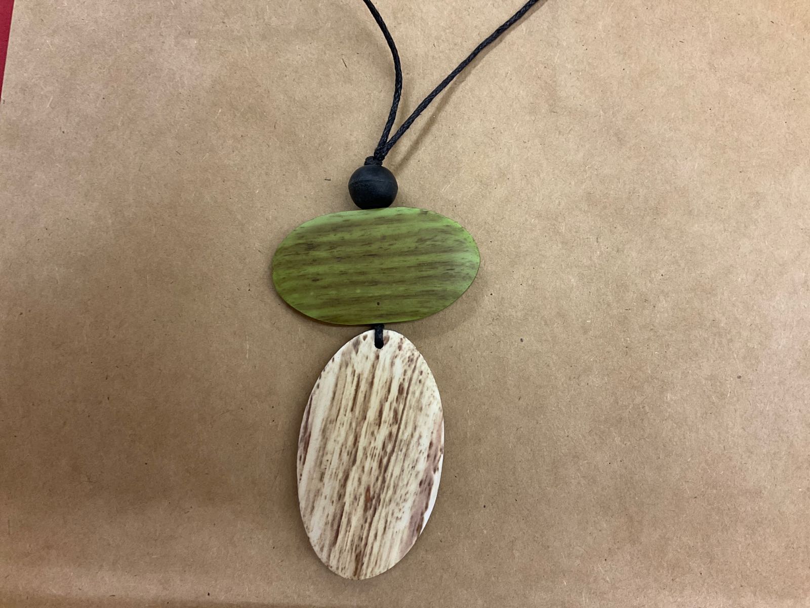 Green wooden disc necklace