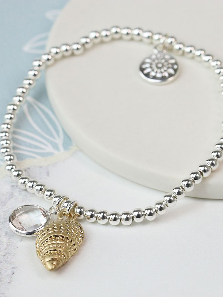 03141 Silver plated bracelet with gold shell and crystal